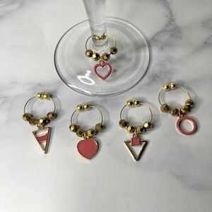 2/$15❤️❤️Red & gold wine charms